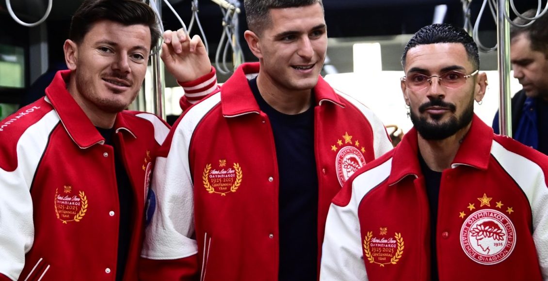 Ολυμπιακός:-Το-επετειακό-τζάκετ-που-έγινε-viral-κατά-την-αναχώρηση-για-Βαρκελώνη